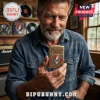 Grateful Dead brass Zippo lighter with Steal Your Face logo and Keep Truckin text held by a man in a denim shirt.!
