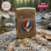 Grateful Dead metal lighter featuring embossed Steal Your Face logo, dancing bears, and text on a rock near a stream.!