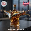 Milano 18-year Scotch whisky glass bottle shaped like a futuristic sci-fi starship with amber liquid on a dark desk.!