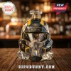 Helldivers 2 B-01 Tactical helmet shaped glass decanter with black and gold geometric details on a wooden table.!