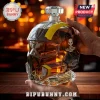 Helldivers 2 themed glass decanter shaped like a soldier helmet, filled with amber liquid, on a wooden surface.!