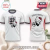 White England soccer jersey with Hello Kitty graphic, red and blue trim, and three lion crest on chest and back.!