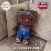 Brown Hello Kitty plush toy wearing an Oklahoma City Thunder basketball jersey, headband, and sneakers on a sofa.!