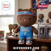 Brown Hello Kitty plush wearing a blue Oklahoma City Thunder jersey number 2, headband, and sneakers on a wooden shelf.!