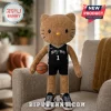 Brown plush cat toy wearing a black San Antonio Spurs basketball jersey with number 1 and holding a miniature basketball.!