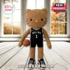 Brown plush Hello Kitty figure wearing a black San Antonio Spurs basketball jersey and holding a small basketball.!