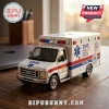 Die-cast white Ford ambulance model with EMS branding, 60th anniversary graphics, and red and blue emergency light strips.!