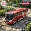 Sydney Swans commemorative diecast bus model in red and white with 152nd anniversary graphics on a stone pathway.!