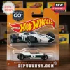 Hot Wheels McLaren M2B diecast car in white and green with number 2 on orange 60th anniversary blister card packaging.!