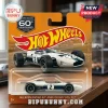 Hot Wheels McLaren Racing 60th Anniversary die-cast model car in white and blue, displayed on orange blister card packaging.!