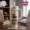 Cream-colored Stanley tumbler featuring How I Met Your Mother character illustrations, MacLaren's Pub booth, and logo.!