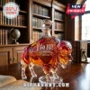 Crystal bison-shaped decanter with diamond stopper, etched with Go IU! and 140th anniversary 1887-2027 text on wood desk.!