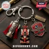 Indianapolis 500 keychain featuring a Borg-Warner trophy charm, red race car, and 110th anniversary commemorative shield.!