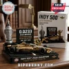Indy 500 2026 champion building block set with gold race car, silver trophy, and display stand on a wooden table.!