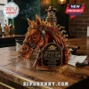 Amber glass horse head whiskey decanter with a skull topper, labeled Inferno Stallion, sitting on a wooden bar counter.!