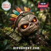 Aztec warrior skull figurine with glowing red eyes, feathered headdress, and tribal carvings on a mossy stone background.!