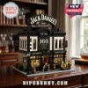 Jack Daniel's 160th anniversary building set made of plastic interlocking bricks with miniature figures on a desk.!
