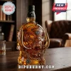 Jack Daniel’s No. 7 bottle shaped like a Motörhead Snaggletooth skull with gold spikes, horns, and a chain on a wood table.!