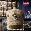 Jacksonville Jaguars 31st anniversary ceramic whiskey bottle with crown stopper, cream finish, and team logo on marble bar.!