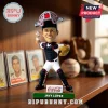 Javy Lopez bobblehead wearing catcher gear on a wooden base with a Coca-Cola logo and baseball card background.!