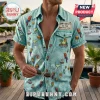 Teal short-sleeve button-down shirt with frayed edges, featuring embroidered tropical parrots, margaritas, and sailboats.!