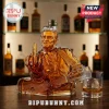 Johnny Cash shaped glass whiskey decanter holding a guitar and giving the middle finger, filled with amber liquid.!