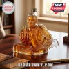 Johnny Cash amber glass decanter shaped as the musician playing a guitar and gesturing with a middle finger.!