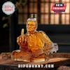 Amber glass decanter shaped like Johnny Cash playing a guitar and giving the middle finger, resting on a wooden surface.!