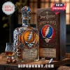 Jose Cuervo Grateful Dead tequila bottle with embossed metal dancing bear and skull logo, matching display box and glass.!