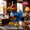 Kansas Jayhawks mascot shaped glass whiskey decanter wearing a top hat and KU logo on a wooden table with glasses.!