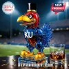 Kansas Jayhawks mascot shaped glass liquor decanter wearing a top hat with KU logo on a glass base, beside a whiskey glass.!