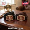 Kappa Alpha Psi leather belts with gold and red enamel crest buckles featuring 1911 text on a mahogany office desk.!