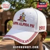 White Kappa Alpha Psi baseball cap with red embroidered Greek letters, crest, 1911 text, and geometric Greek key trim.!