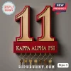 Kappa Alpha Psi wooden wall key holder with number 11 in red and natural wood finish, featuring seven gold hooks.!