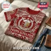Kappa Alpha Psi red t-shirt with white 1911 Greek crest, floral filigree, and geometric patterns on a beige bed sheet.!