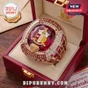 Kappa Alpha Psi fraternity gold ring featuring a large red center stone, crest, and diamond accents inside a red case.!