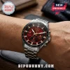 Kappa Alpha Psi silver stainless steel watch with deep red dial, crystal indices, and black tachymeter bezel on wrist.!