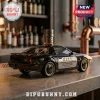 Black K.I.T.T. Knight Rider replica car decanter with a silver door label on a stone bar counter.!