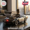 Black Knight Rider K.I.T.T. car whiskey decanter with a red scanner light and metallic cap on a marble desk surface.!
