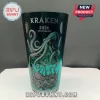 Kraken 2026 Anniversary drinking glass with teal and black gradient featuring a sea monster and shipwreck illustration.!