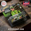 Kyle Busch NASCAR legacy memorial Hot Wheels die-cast car in green M&M packaging on a rustic wooden workbench.!