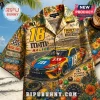 M&M's racing Hawaiian shirt featuring a Kyle Busch No. 18 Toyota Camry, floral patterns, and checkered flag graphics.!