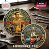 Kyle Busch commemorative gold-toned metal coin featuring his M&M racing suit, number 18 car, and NASCAR track details.!