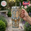 Lionel Messi 10 tumbler in blue and gold with rhinestone accents, cityscape, and World Cup trophy icon held in hand.!