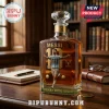 Lionel Messi glass decanter with crystal stopper, gold number 10, and 3 Goals, 1 Match, 1 Legend text on a wood desk.!