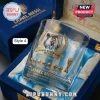 Lionel Messi glass tumbler with gold engravings of the World Cup trophy and soccer balls in a blue velvet display case.!
