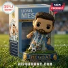 Lionel Messi vinyl figure in Argentina kit on a grass base with a display box showing achievements and gold text.!