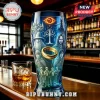 Lord of the Rings pint glass featuring the One Ring, Gandalf, Aragorn, and hobbits printed in blue tones on a bar counter.!