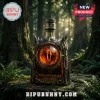 Lord of the Rings Eye of Mordor whiskey bottle with dark metallic casing, amber liquid, and 25th anniversary labeling.!