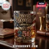 Lynyrd Skynyrd America 250 whiskey glass featuring an American flag, eagle wings, and the text 1776-2026 on a wood desk.!